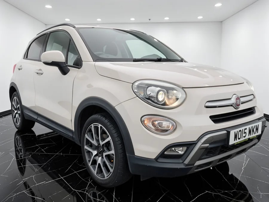 White compact SUV on a bright studio backdrop, produced by Motuva Studio from a phone photo